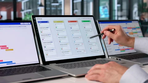 Man In Office Using Software To Organize Stock Footage 334537293