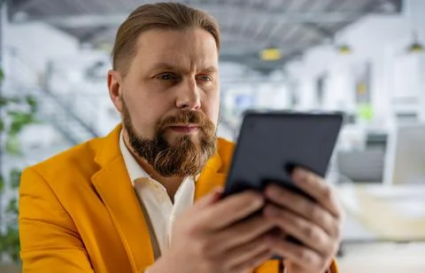 Man at office using tablet Stock Photos
