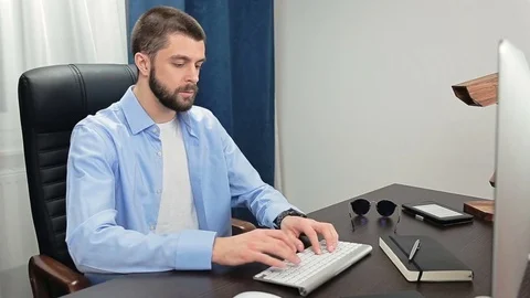 Man in the office work Stock Footage 69879616