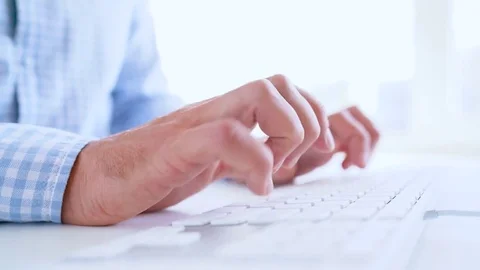 Man office worker typing on the keyboard Stock Footage 80981937