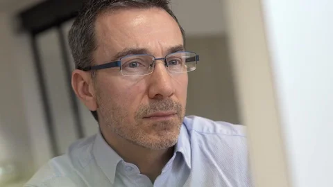 Man in office working on desktop computer Stock Footage 124524943
