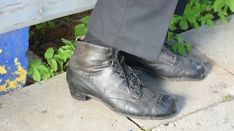Man in old shoes Stock Footage 108528925