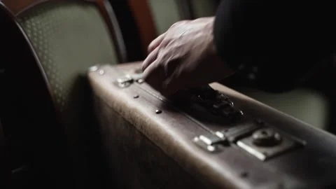 Man with old worn brown suitcase Stock Footage 314761507