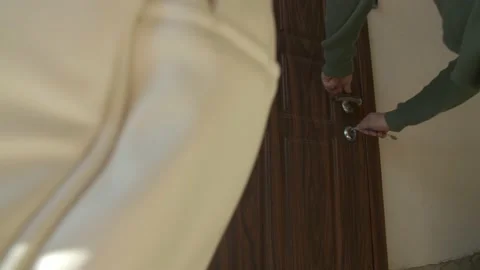 Man open the door with a key Stock Footage 130640805