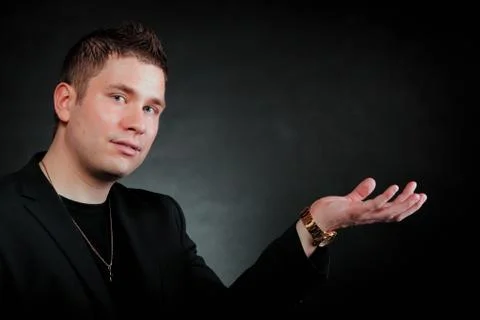 Man with open empty hand copyspace for product Stock Photos