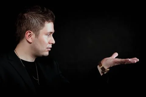 Man with open empty hand copyspace for product Stock Photos