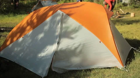Man open the tent, see on forest with smile and close tent Stock Footage 64478353