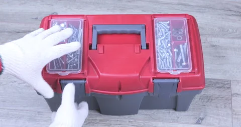 Man open the toolbox and take the tool from it Stock Footage 125973465