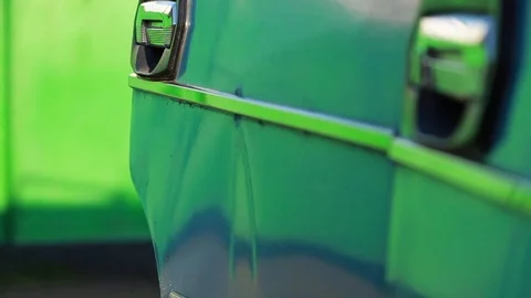 The man opened the car door and then closed it.At this time opens the back door Stock Footage 85285349