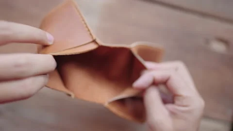 The man opened the wallet and had no money. Stock Footage 148101931