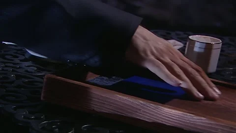 The man opened the wooden box to retrieve the documents Stock Footage 276516503