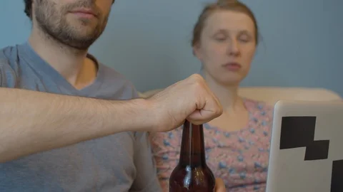 Man opening a bottle of beer Stock Footage 129232438