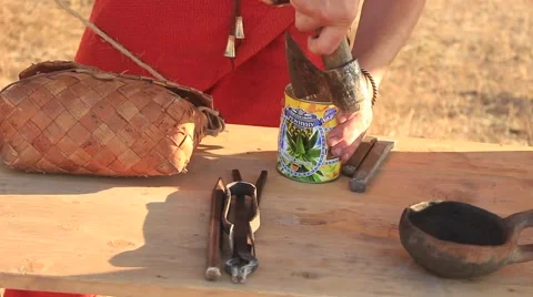 Man is Opening Can with the Axe During Historical Festival Stock Footage 58443246