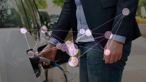 Man opening car port, plugging blue cable for EV charging while network nodes Stock Footage 333790056