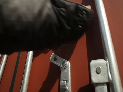 Man is opening  a container Stock-Footage 76528566