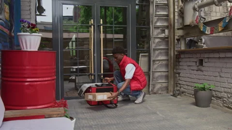 Man Opening Delivery Bag Full of Parcels 스톡 동영상 316588936