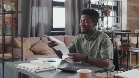Man Opening Envelope with Letter Stock Footage 194530046