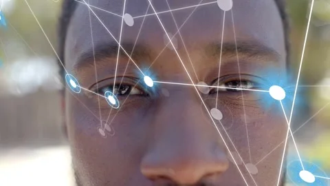 Man opening eyes as network nodes slide from left, aligning near eyes for AR Stock Footage 333278018