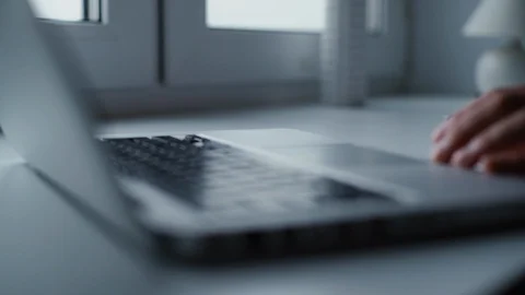 Man opening laptop and starts typing on keyboard of computer, close-up. Stock Footage