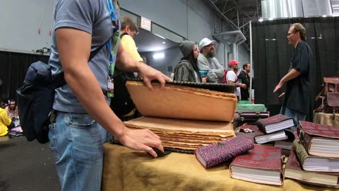 Man opening leather book Video stock 148517576