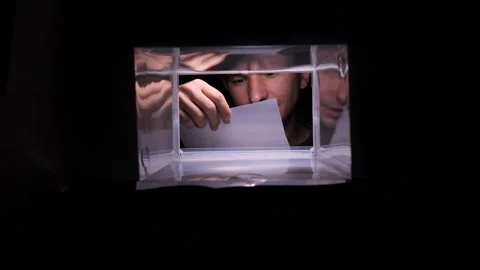 Man opening mailbox receiving interesting letter with a smile Stock Footage 322912102