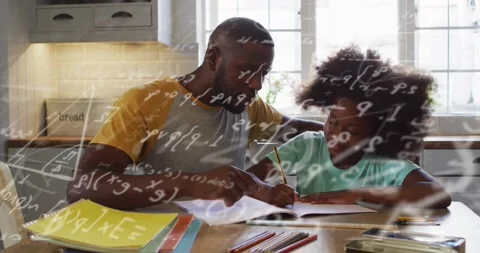 Man opening math book guiding child solving problem in kitchen with transparent Stock Footage 326891626