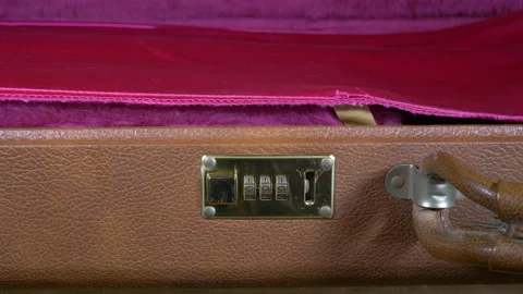 Man opening a plush lined electric guitar case. Stock Footage 138870896