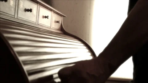 Man opening roll top desk and removing items. Stock-Footage 70807415