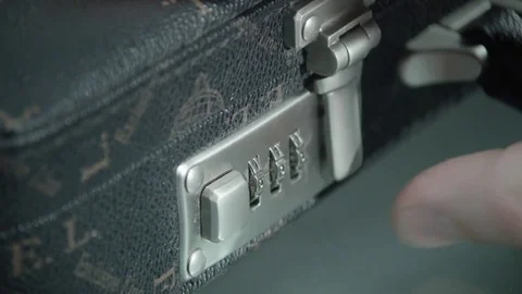 Man opening a suitcase with a code. Close up Stock Footage 71271620