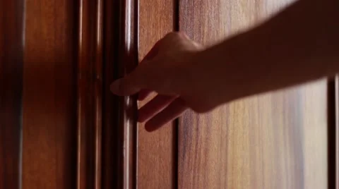 Man opening a wardrobe Stock Footage 63456342