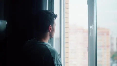 Man opening window and breathing fresh air at home 스톡 동영상 319442254