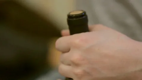 Man is opening a wine bottle Stock-Footage 82543275