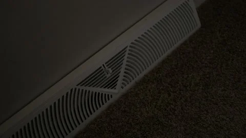 Man opens air vent from a floor diffuser Stock Footage 222189213