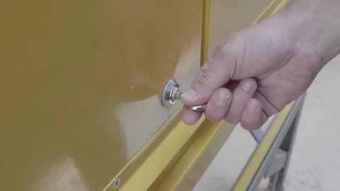 A man opens and closes a closet with a team Stock Footage 132491900