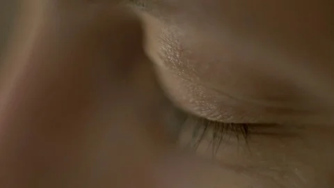 Man opens and closes his eyes close up Stock Footage 81397293