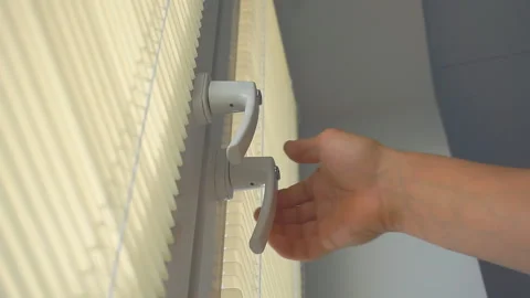 Man opens and closes the window Stock Footage 94489820