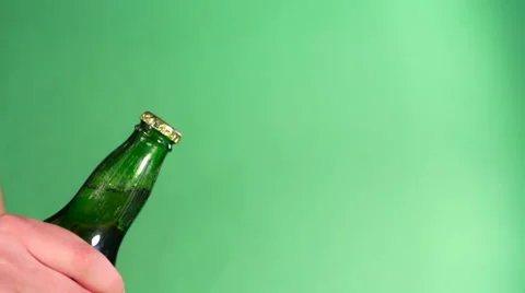 Man opens a bottle of beer Stock Footage 62017829