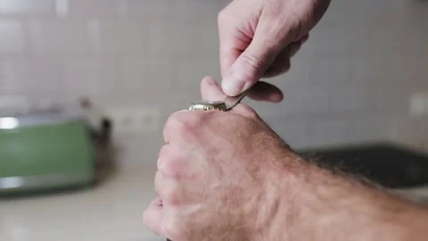 Man opens a bottle of beer Stock Footage 147174120