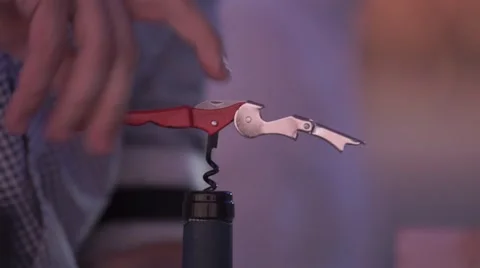 Man Opens a Bottle of Wine Stock Footage 65255933