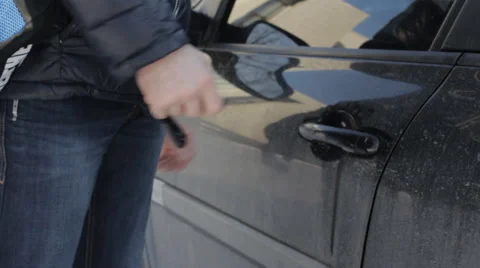 A man opens a car Stock Footage 45708827