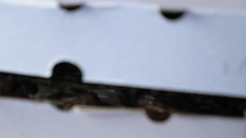 A man opens a cardboard box in which lies a hot appetizing pizza with cheese Video stock 200993546