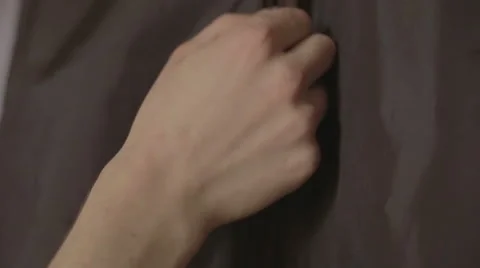 A man opens a case for a suit Stock Footage 58279026