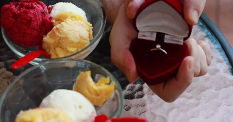A man opens a case with a wedding ring (close-up) Stock Footage 243215796