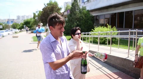 Man opens champagne Stock Footage 68542758