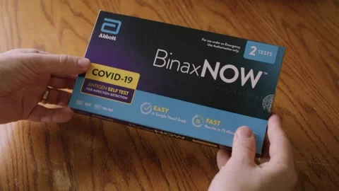 Man Opens COVID-19 Take-Home Test from packaging to test for Coronavirus Stock Footage 168504851
