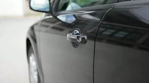 Man opens door and sits in the black car Stock Footage 11198242