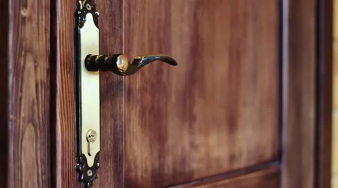 The man opens the door by the handle Video stock 48048723