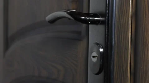 The man opens the door key Stock Footage 59726344