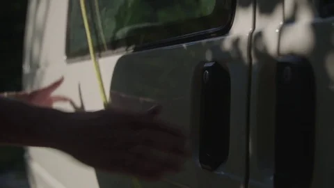 Man opens a door of a van. Video stock 76735340