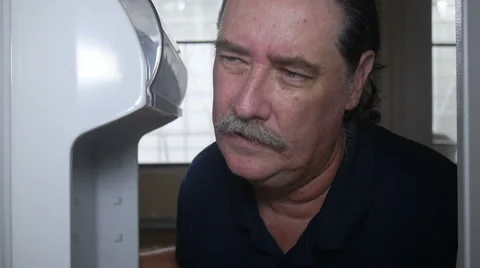 Man opens empty refrigerator Stock Footage 55542851